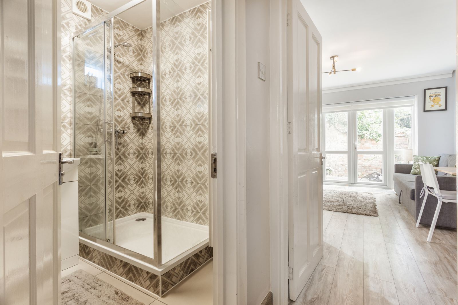 Shower room and hallway to the living room