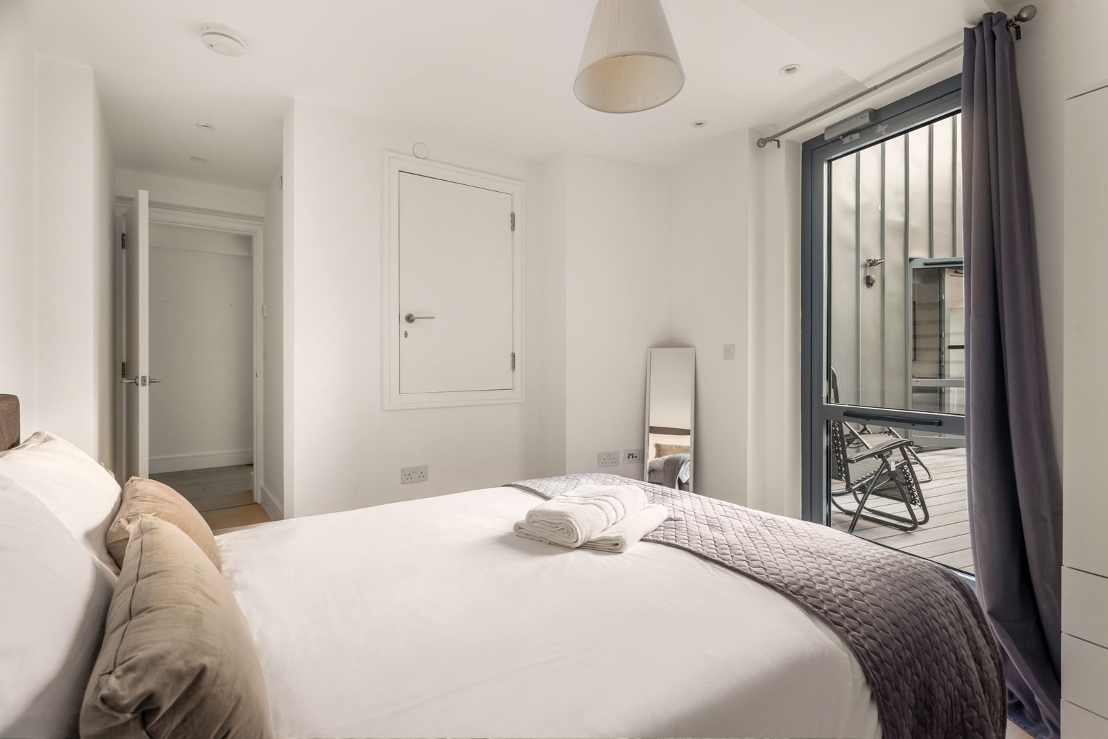 Second bedroom looking out to the terrace
